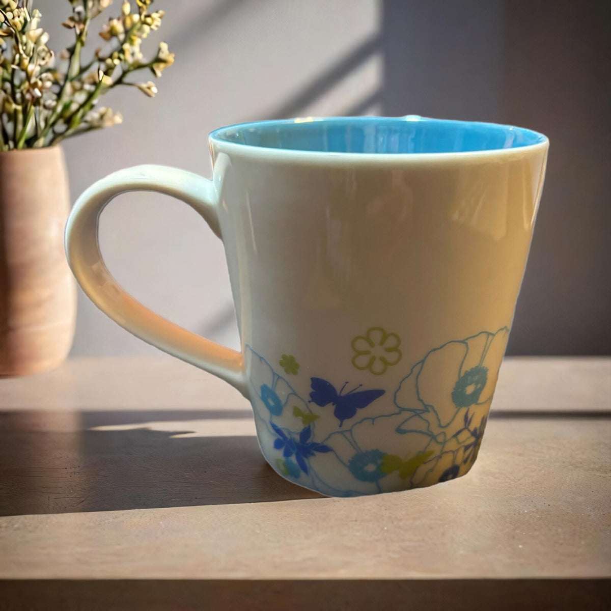 Vintage STARBUCKS 2006 Flowers Butterflies Blue Interior Coffee Tea Cup 11oz.